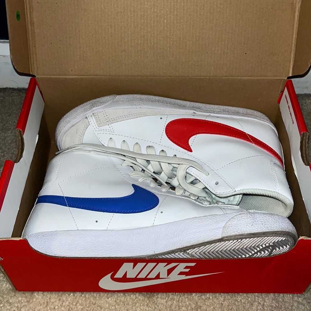 Nike Women's White High-Top Sneakers with Red and Blue Swooshes
